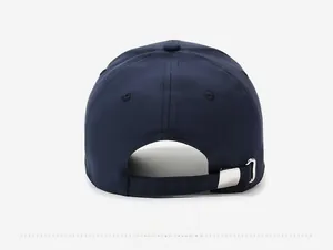Detail view of navy blue baseball cap back with adjustable strap and silver metal buckle