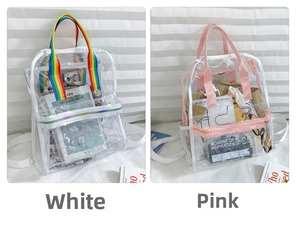 Detail view of transparent PVC backpacks with rainbow and pink straps for students