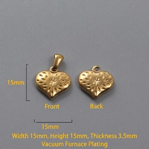 Detail view of 15mm 18k gold heart pendant with radial texture and star engraving