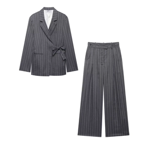 Elegant dark grey striped women's suit set with belted blazer and wide-leg trousers