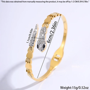 Detail view of 18k gold snake bracelet with size dimensions and sparkling rhinestones