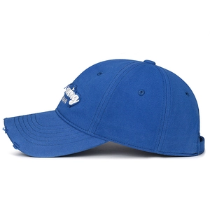 Blue distressed golf baseball cap with Running MAN embroidery and curved brim in side view