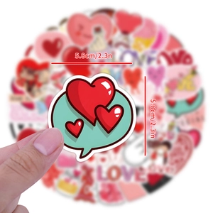 Hand holding red love heart speech bubble sticker with 5.8cm size measurement label