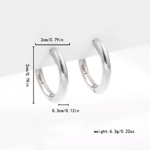 Detail view of silver C-shaped hoop earrings showing 2cm size and 6.3g weight details