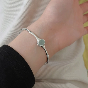 Minimalist S925 sterling silver irregular lava texture bracelet with green gemstone