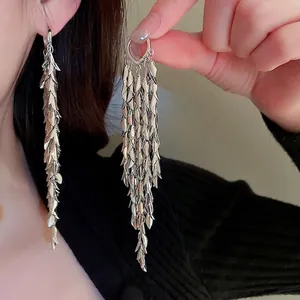 Elegant silver leaf tassel drop earrings featuring multi-layered metallic fringe design