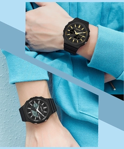 Dual display digital analog watch showing black gold and black silver finish wristbands