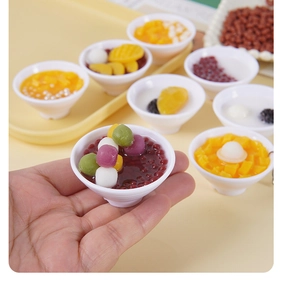 Detailed close-up of 5cm miniature dessert bowls held by hand showing micro scale realism