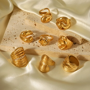 Elegant 18k gold plated stainless steel rings collection with floral and minimalist designs