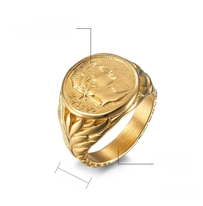Macro shot of 18mm gold stainless steel ring with embossed Caesar coin and laurel wreath