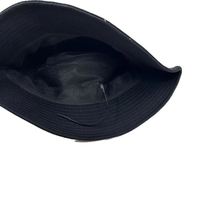 Detailed view of the black bucket hat interior showing breathable lining and adjustable drawstring