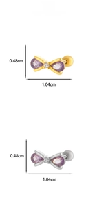 Macro view of bow-shaped stud earrings featuring purple teardrop gems and white diamonds