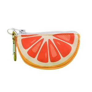 Orange slice shaped pet waste bag dispenser with green metal hook on white background