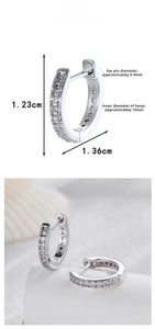 Detail view of silver hoop earrings showing dimensions 1.23cm height and 1.36cm width