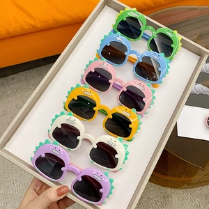 Cute cartoon dinosaur sunglasses for kids in six vibrant colors with plastic frames