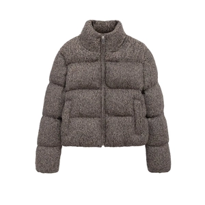 Detailed view of the dark grey marl textured fabric and zipper on winter stand collar jacket