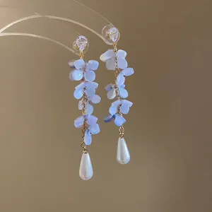 Elegant light blue gradient flower earrings with teardrop pearls and rhinestone accents