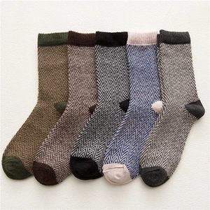 Set of five herringbone knit wool socks in green brown and grey for autumn and winter