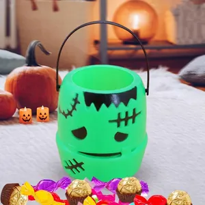 Green Frankenstein plastic candy bucket with handle for Halloween trick or treat kids party