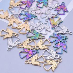Macro shot of colorful 18k gold plated angel wing charms and DIY necklace pendants
