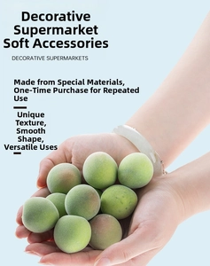 Macro shot of realistic green artificial plum models with a fine frosted texture and soft fuzz
