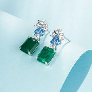 Elegant S925 silver drop earrings with emerald-cut green gems and blue accent stones