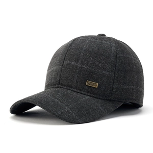 Men's winter baseball cap in dark grey plaid with protective ear flaps and warm lining