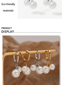 Detailed view of eco-friendly pearl hoop earrings in gold and silver finishes