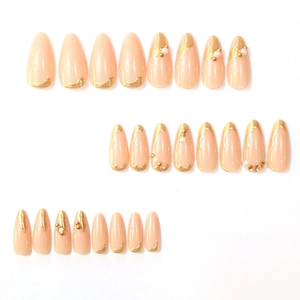 24pcs long almond press-on nails with golden gilding, pearls, and rhinestones
