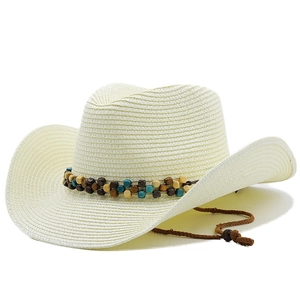 Detail of cream straw cowboy hat featuring vintage colorful wooden beads and chin strap