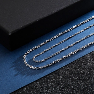 Polished silver stainless steel O-chain necklaces displayed on a professional background
