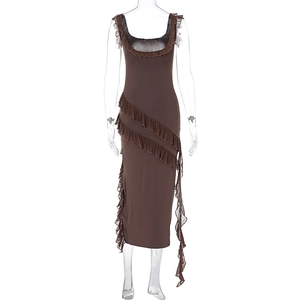 Detail of brown sleeveless bodycon dress featuring ruffles and a side slit design
