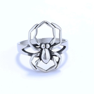 Gothic spider-shaped stainless steel ring with vintage oxidized finish on white background