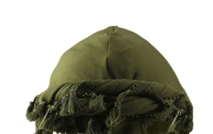 Detail of army green durag with satin lining and tassels on a model head for hair protection