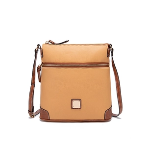 Detail of lychee grain texture and stitching on the camel brown crossbody bag