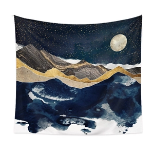 Detailed texture of modern abstract tapestry featuring starry sky and golden mountain peaks