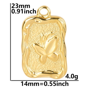 Detail view of gold butterfly pendant with measurements 23mm height and 14mm width
