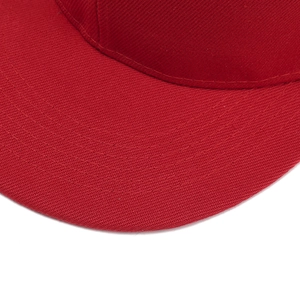 Close-up of red hip-hop baseball cap brim showing high-density cotton twill and stitching