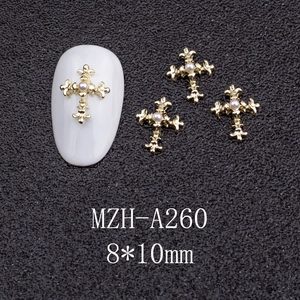 Detail of golden cross nail art charm with white pearl, 8x10mm size, item MZH-A260