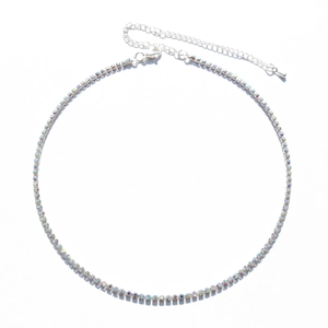 Detailed macro view of sparkling rhinestone necklace with lobster clasp and extension chain