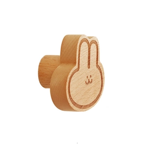 Minimalist rabbit-shaped solid wood hook and drawer handle in natural beech finish