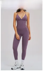 Detailed view of dusty rose yoga set featuring V-neck camisole and high waisted leggings