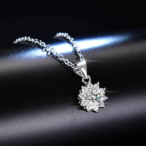 Close-up of sparkling heart-shaped moissanite necklace pendant with brilliant diamonds