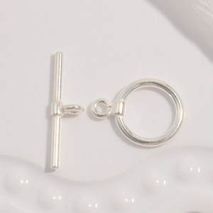 Detailed macro view of S925 sterling silver heart clover OT toggle clasp for jewelry making