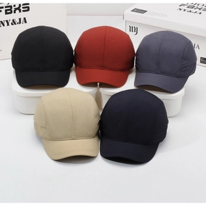 Detail view of quick-dry short brim baseball caps in five colors with reinforced stitching