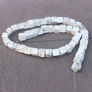 Macro shot of square white turquoise beads with natural marble texture for DIY jewelry