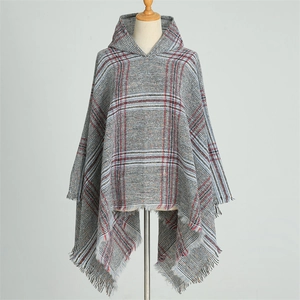 Classic plaid hooded poncho with fringe trim in grey white and red soft knit fabric