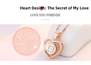Macro detail of rose gold heart projection necklace with I Love You in 100 languages