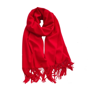 Vibrant red faux cashmere scarf with tassels for winter warmth on white background