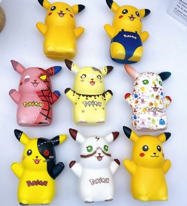 Flat lay view of eight colorful Pokémon Pikachu figure toys in various fun outfits